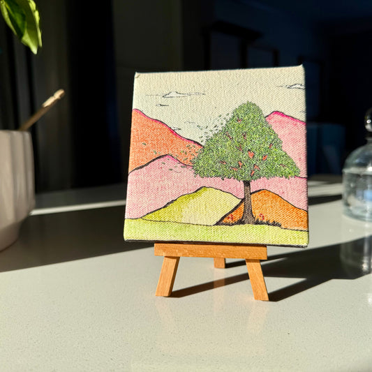 Original mini canvas wall art celebrating fatherhood – piece 2 frame with easel on a table with natural light