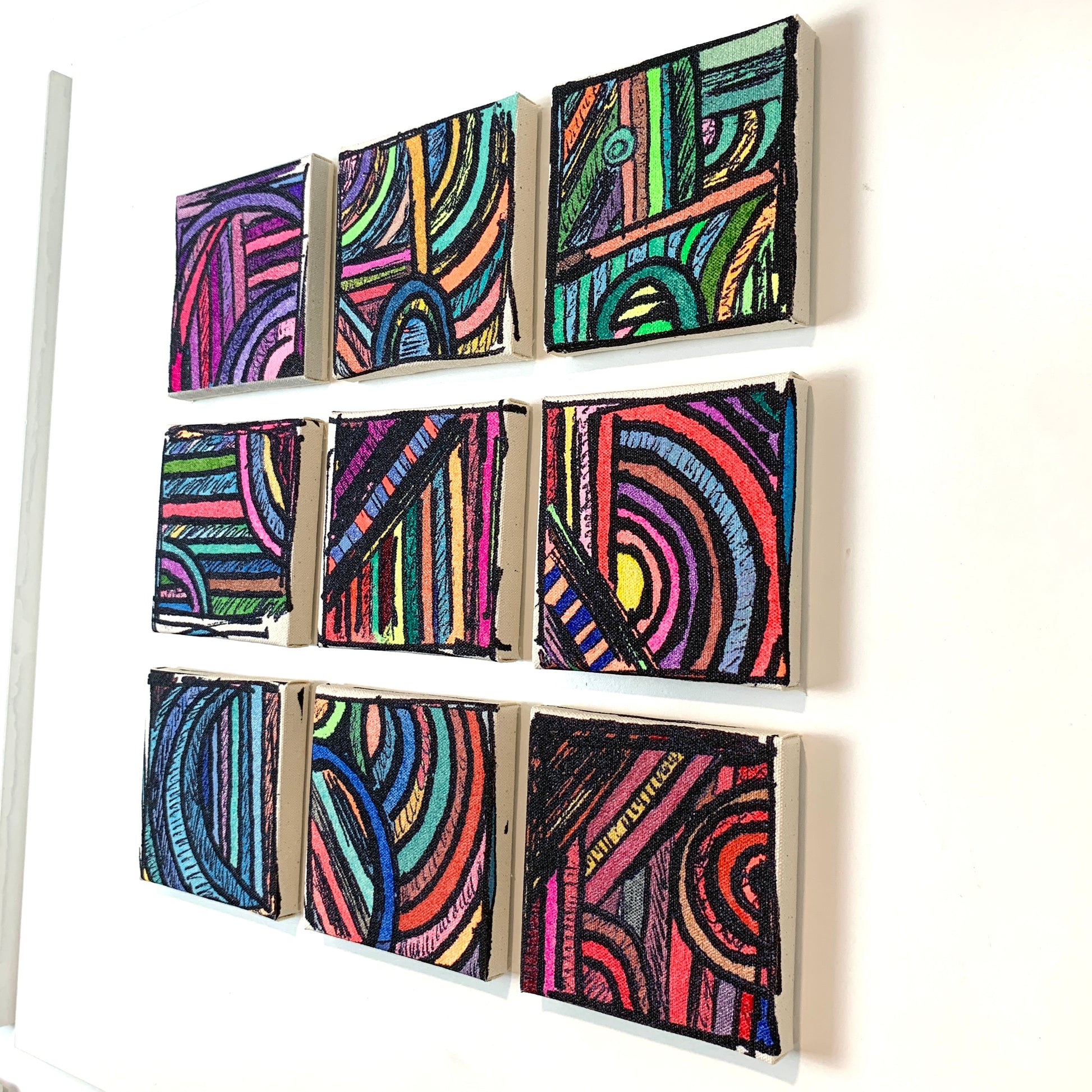 9-piece limited edition canvas wall art set representing family bonds represented on a wall